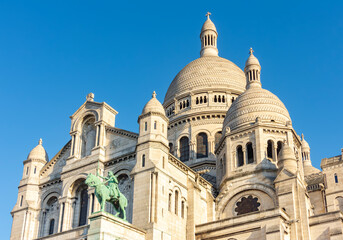 Fototapeta na wymiar Basilica of Sacre Coeur (Sacred Heart) on Montmartre hill, Paris, France