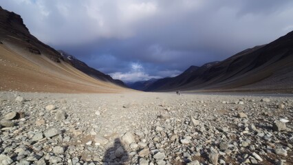 Moody mountain valley under overcast sky
