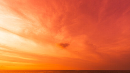 Dramatic red, orange sunset sky over sea in the evening, Red storm clouds sun dawn, Horizon sea sky landscape colorful sunrise, Dusk sky background