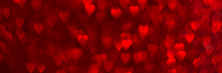 Red hearts, sparkling glitter bokeh background banner, valentines day abstract defocused texture header