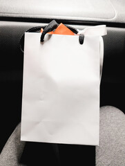 Blank white shopping bag with black handles