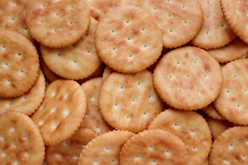 Macro shot of randomly placed crackers. Textured background.