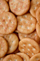 Macro shot of randomly placed crackers. Textured background.