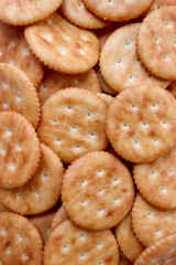 Macro shot of randomly placed crackers. Textured background.