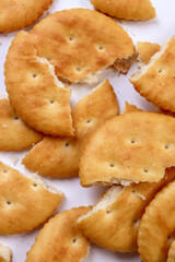 Texture of broken cracker pieces.