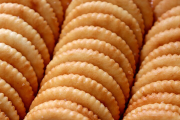 Stacked crackers. Close-up, zoomed-in cut.