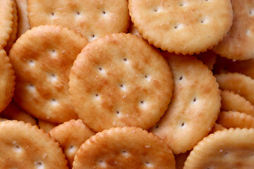 Macro shot of randomly placed crackers. Textured background.