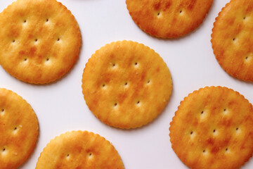 Crackers lined up in a row. Close-up cut.