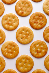 Crackers lined up in a row. Close-up cut.
