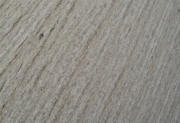 Detailed view of raw wooden plank texture with fine natural lines, ideal for backgrounds and design.