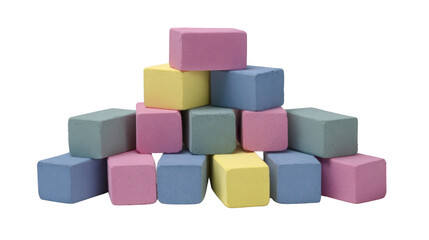 Obraz premium Colorful pastel blocks stacked pyramid shape, featuring shades of pink, blue, yellow, and gray, evoke playful and creative atmosphere. These blocks are perfect for educational or decorative