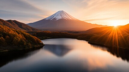 Fototapeta premium A breathtaking landscape captures the serene beauty of Mount Fuji at sunset, reflecting on tranquil waters, symbolizing harmony and the magnificence of nature's creations.