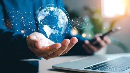 A person's hands hold a holographic representation of Earth, overlaid with a network of connections - Powered by Adobe