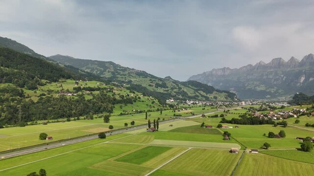 Scenic Aerial View of Rural Countryside and Alpine Landscape Near Flums, Berschis and Walenstadt, Switzerland &ndash; Drone Footage