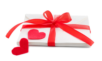 Stack of love letters and paper hearts isolated on white