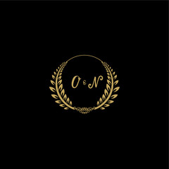 Fototapeta premium ON beautiful feminine and elegant wedding monogram initial logo with circle floral gold
