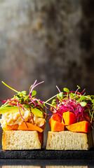 Mini sandwiches: chickpea spread with sauerkraut, turkey with sweet potato and tofu with avocado and microgreens