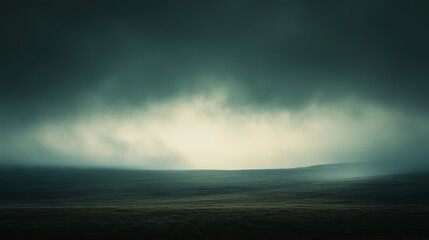 Obraz premium Eerie Foggy Field Under a Dark Sky