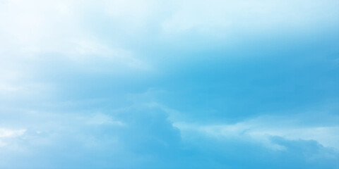 Fototapeta premium Abstract watercolor blue background. watercolor painting, blue sky overcast above the clouds in horizontal view, beautiful cloudscape for white natural canvas image 