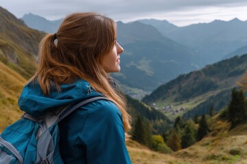 Naklejka premium Woman with backpack gazes at mountainous landscape serene contemplative