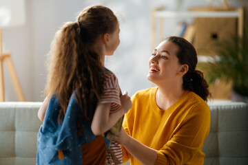 Happy family preparing for school