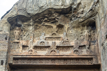 Ancient Indian Rock-Cut Facade with Multiple Levels
