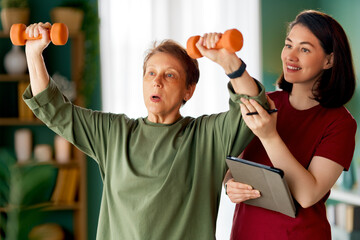 Senior woman doing dumbbell exercise