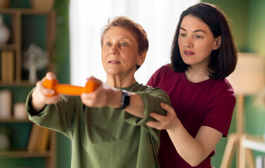 Senior woman doing dumbbell exercise