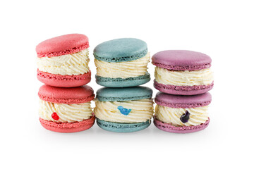 Colorful macaron cakes. Small french muffins. Colorful macarons on a white background with clipping path.