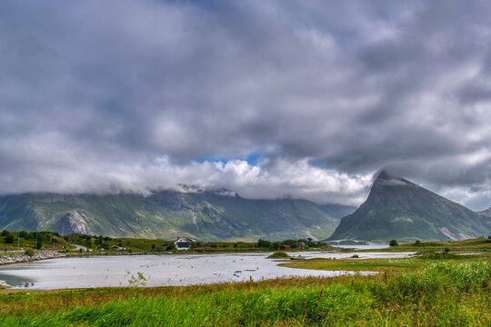 Flakstad is a municipality in the Lofoten Islands, Norway. It is located on the island of Flakstadoya. The administrative center of the municipality is Ramberg,