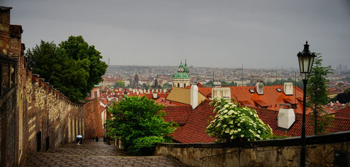 Romantic view of Mala Strana neighborhood under the rain in Prague, Czech Republic