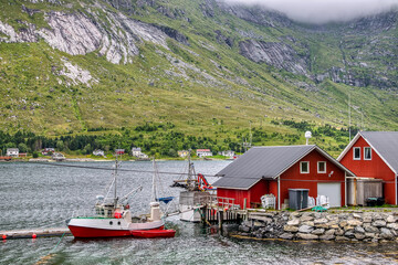 Flakstad is a municipality in the Lofoten Islands, Norway. It is located on the island of Flakstadoya. The administrative center of the municipality is Ramberg,