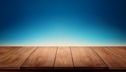 empty brown wooden table top over blue gradient background