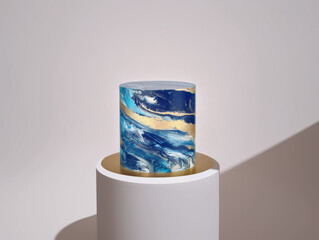 Obraz premium Modern abstract cake with blue, gold, and white marble pattern. Luxury artistic dessert, elegant celebration centerpiece, creative confectionery design, minimal background, close-up.