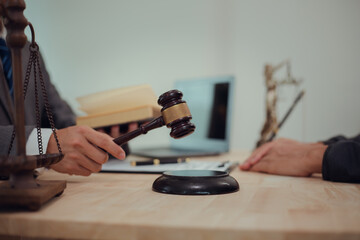 Businessmen consult with lawyers, submit additional documents, and pay for lawyers' services. After reaching an agreement and signing the contract, the two shake hands. Concept, Justice, and Lawyers