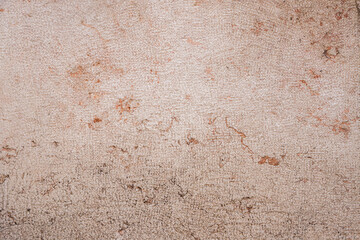 Textured Beige Plaster Wall Background with Cracks and Natural Patterns