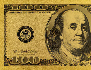 Gold 100 dollar bill for design purposes. Money of the United States of America.