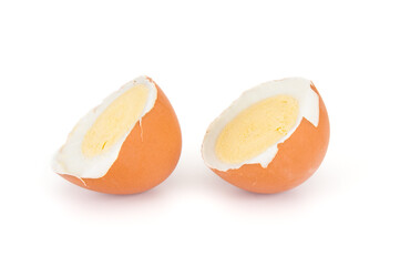 Two halves of egg isolated on white background