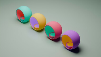 Four hollow spheres arranged in diagonal line on flat surface