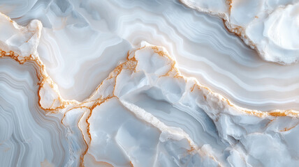 Elegant marble texture with soft blue and gold veins
