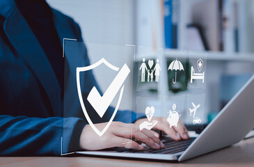 Insurance and Protection Services Concept. Businesswoman using laptop with icons representing various insurance services, including health, family, car, life, travel, financial protection, security,