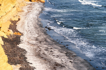 A secluded beach along the cliffs of Paracas National Reserve, Peru