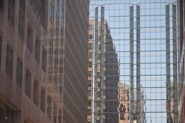reflections on glass buildings in downtown ottawa  