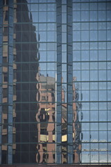 reflections on glass buildings in downtown ottawa  