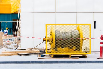 Construction site with yellow winch