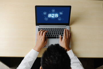 Business person navigates B2B landscape, harness technology to enhance business-to-business...