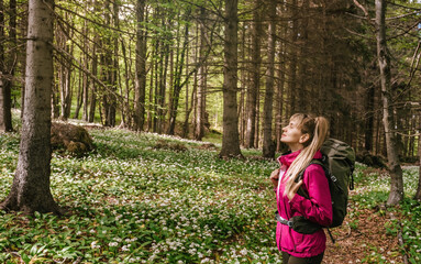 Woman Breathing Fresh Air in Forest Glade