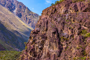 Majestic mountain peaks and rugged rocky cliff