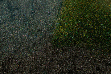 Macro of green and brown glittery texture