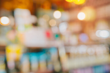 Blurry background. Soft Focus Background of a Colorful Shop Display with Lights and Various Products in a Retail Environment